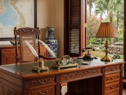 Indochina vs Mediterranean table in the chairman office interior