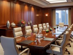 Leather-wood color harmony in chairman’s meeting room